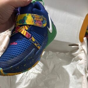 Nike Blue and Green Sneakers with Dynamic Lacing and Cushioned Support